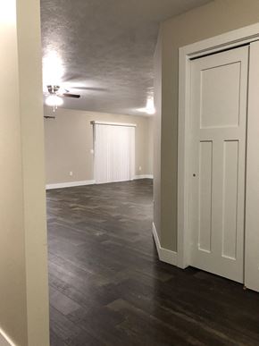 Dell Rapids apartment for rent - A room with a white door and a window with blinds.