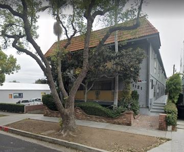 West Hollywood apartment for rent - a house with a tree in front of it