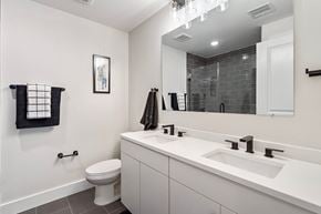 Newark apartment for rent - a bathroom with a sink and a toilet and a mirror