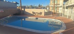 Las Vegas apartment for rent - A small pool with a concrete floor and a concrete wall.