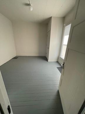 Lima house for rent - an empty room with white walls and a white door