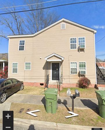 Florence house for rent - a house with a parking meter in front of it