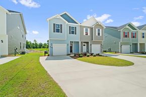 Jacksonville house for rent - A row of houses with a clear blue sky above them.