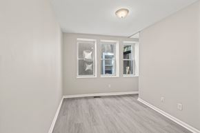 Philadelphia apartment for rent - A room with a grey floor and a window with a white frame.