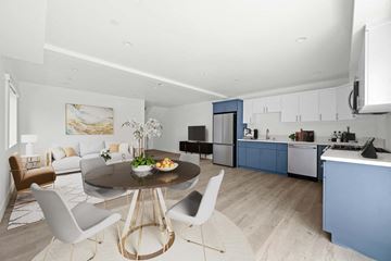 Los Angeles apartment for rent - a living room and kitchen with a table and chairs