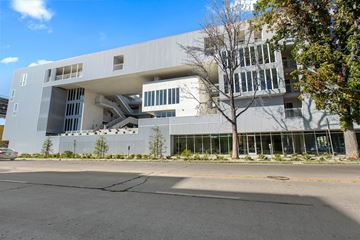 North Hollywood apartment for rent - A modern building with a white facade and large windows.