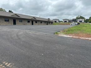 Bowling Green apartment for rent - an empty parking lot in front of a building