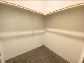 Merced house for rent - an empty room with white walls and a carpet