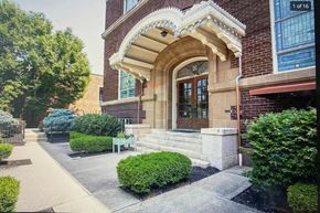 Columbus apartment for rent - the front of a brick building with stairs and a door