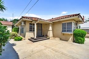 Fresno apartment for rent - a small house with a driveway and a front door