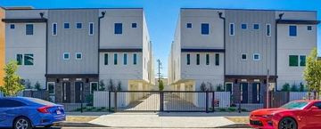 North Hollywood apartment for rent - a row of apartment buildings with cars parked in front of them