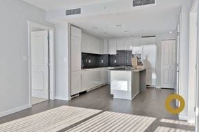 Richmond house for rent - a large white kitchen with a white