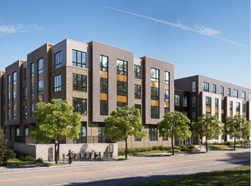 Roslindale apartment for rent - A modern apartment complex with a mix of brown and beige tones.