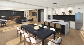 Roslindale apartment for rent - A modern kitchen with a dining table and chairs.