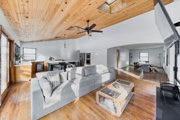 Fremont house for rent - a living room with a couch and a ceiling fan