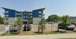 Spruce Grove apartment for rent - an image of an apartment building in a parking lot