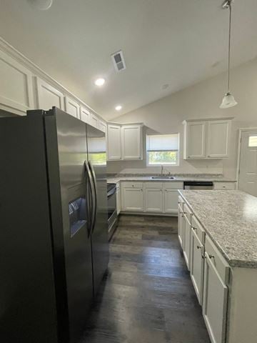 Lima apartment for rent - a kitchen with white cabinets and a stainless steel refrigerator