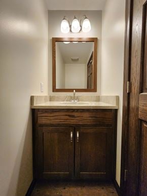 Elida apartment for rent - A bathroom with a sink and a mirror above it.