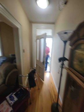 New Glasgow apartment for rent - A hallway with a vacuum cleaner on the floor.