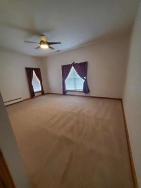 Bluffton house for rent - an empty living room with wooden floors and a ceiling fan