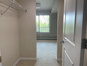 Edmonton apartment for rent - an empty room with a window and a closet