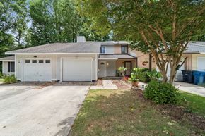 Jacksonville house for rent - A two-story house with a garage and a driveway.