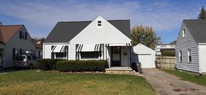 Lima house for rent - a small white house with a yard in front of it