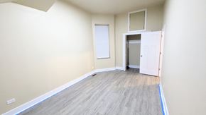 Chicago apartment for rent - an empty room with white walls and wood floors