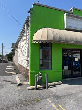 Hagerstown apartment for rent - a green building on the side of a street