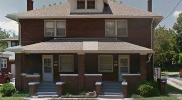 Lima apartment for rent - a brick house with blue steps in front of it