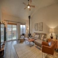 Pagosa Springs house for rent - a living room with a couch and a ceiling fan