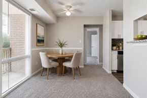 Laurel apartment for rent - A dining room with a table and chairs.