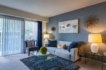 Laurel apartment for rent - a living room with a couch and a table