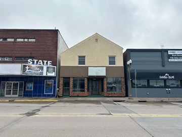 Menomonie apartment for rent - A building with a sign that says "STATE" on it.