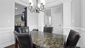 Spring Lake house for rent - a kitchen with a marble table and black chairs