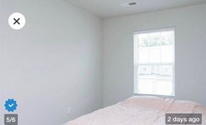 Duncan house for rent - an empty bedroom with a bed and a window
