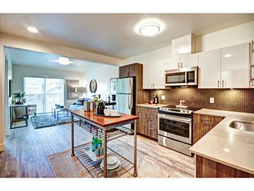 Seattle apartment for rent - a kitchen and living room with a table