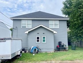 New Albany apartment for rent - a blue house with a truck in front of it