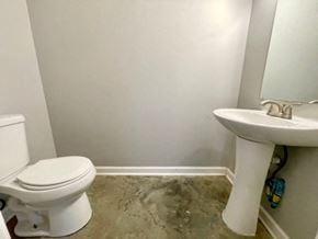 New Albany apartment for rent - a white bathroom with a toilet and a sink