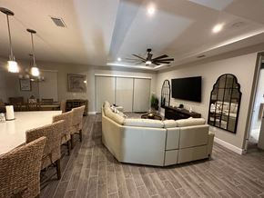 Palmetto house for rent - view of the living room and dining room from the kitchen