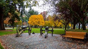 Vancouver apartment for rent - A park with cannons and a bench.
