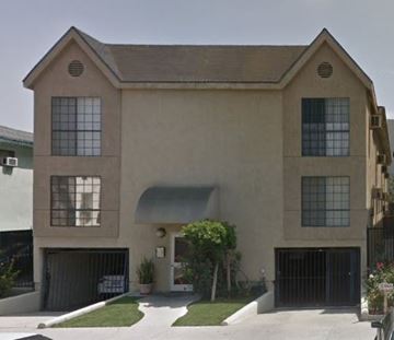 Los Angeles apartment for rent - a large house with a driveway and a garage