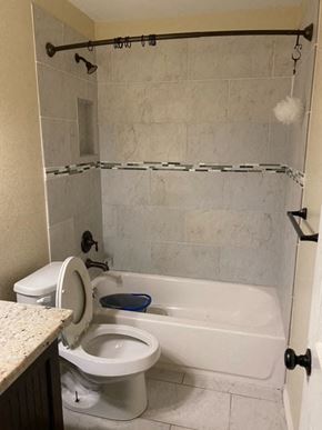 Pasadena house for rent - a bathroom with a toilet and a bath tub