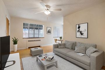 Denver apartment for rent - a living room with a couch and a ceiling fan