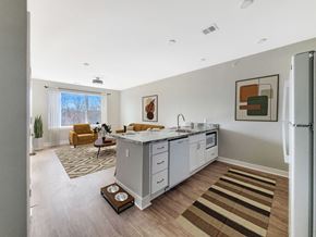 Clinton apartment for rent - a kitchen with a counter top and a refrigerator