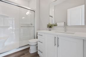 Arnprior apartment for rent - a white bathroom with a shower and a sink