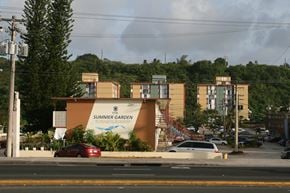 Tamuning apartment for rent - a view of the summer garden hotel from the street