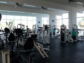Tamuning apartment for rent - a gym with a lot of exercise equipment