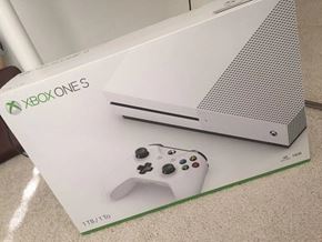 West Vancouver apartment for rent - a nintendo wii game console and a controller on top of a box