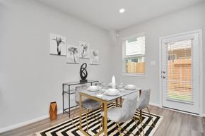 Houston house for rent - an image of a dining room with a table and chairs
